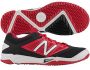 red and black new balance turfs