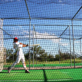 Batter In Home Batting Cages
